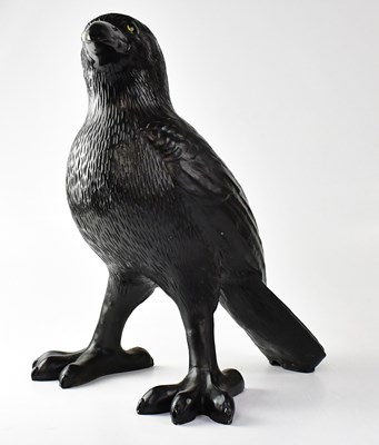 Lot 212 - A large resin figure of a crow, height approx....