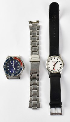 Lot 884 - SEIKO; a stainless kinetic wristwatch, the...