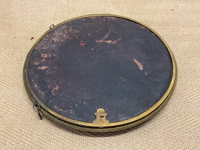 Lot 79 - A 19th century circular wall mounted velvet...