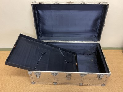 Lot 624 - Two aluminium travelling trunks with rivet...