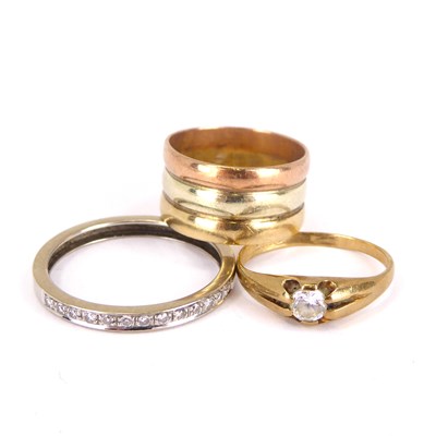 Lot 737 - Three 9ct gold rings comprising a three-colour...