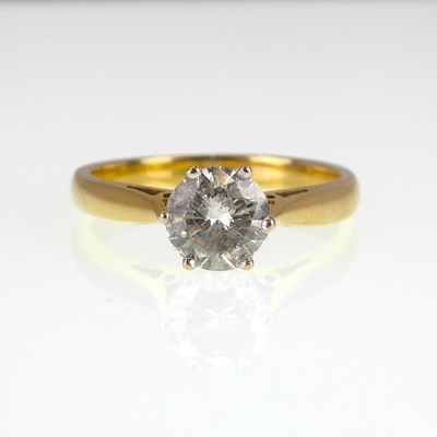 Lot 688 - An 18ct yellow gold diamond solitaire ring,...