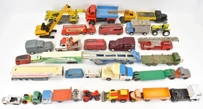 Lot 588 - A collection of playworn diecast commercial,...