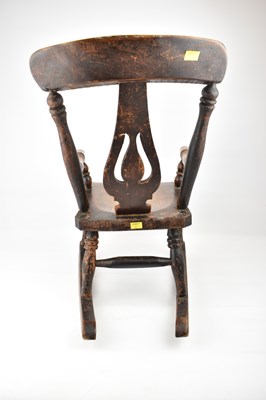 Lot 92 - A children's small Windsor rocking chair.