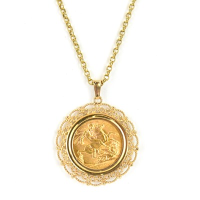 Lot 791 - A George V 1925 full sovereign in a 9ct gold...