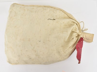 Lot 665 - A lead sealed canvas bank bag containing a...