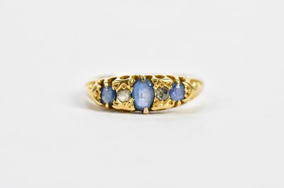 Lot 184 - An 18ct yellow gold sapphire and diamond dress...