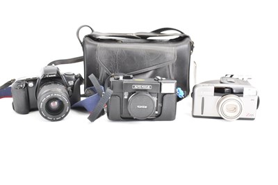 Lot 535 - Three vintage cameras comprising Canon Z115,...