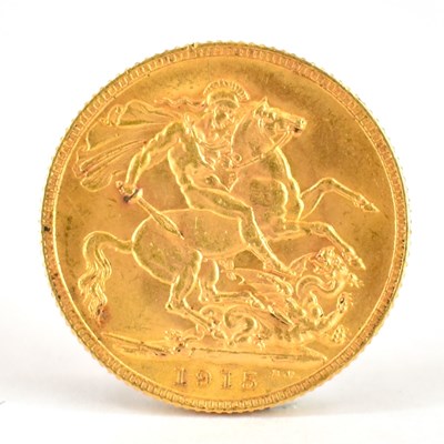 Lot 629 - A George V full sovereign 1915, George and...