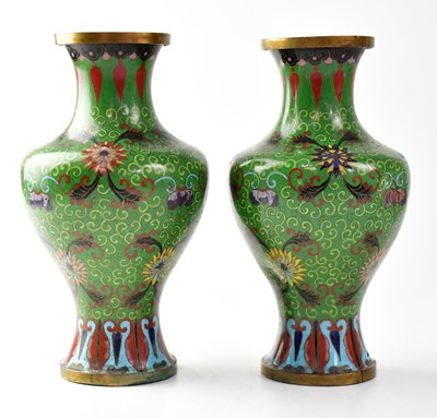 Lot 396 - A pair of cloisonné vases with green grounds,...