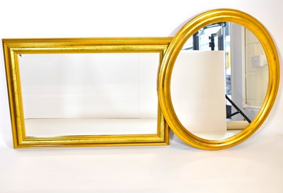 Lot 106 - Two modern gilt wood mirrors comprising an...