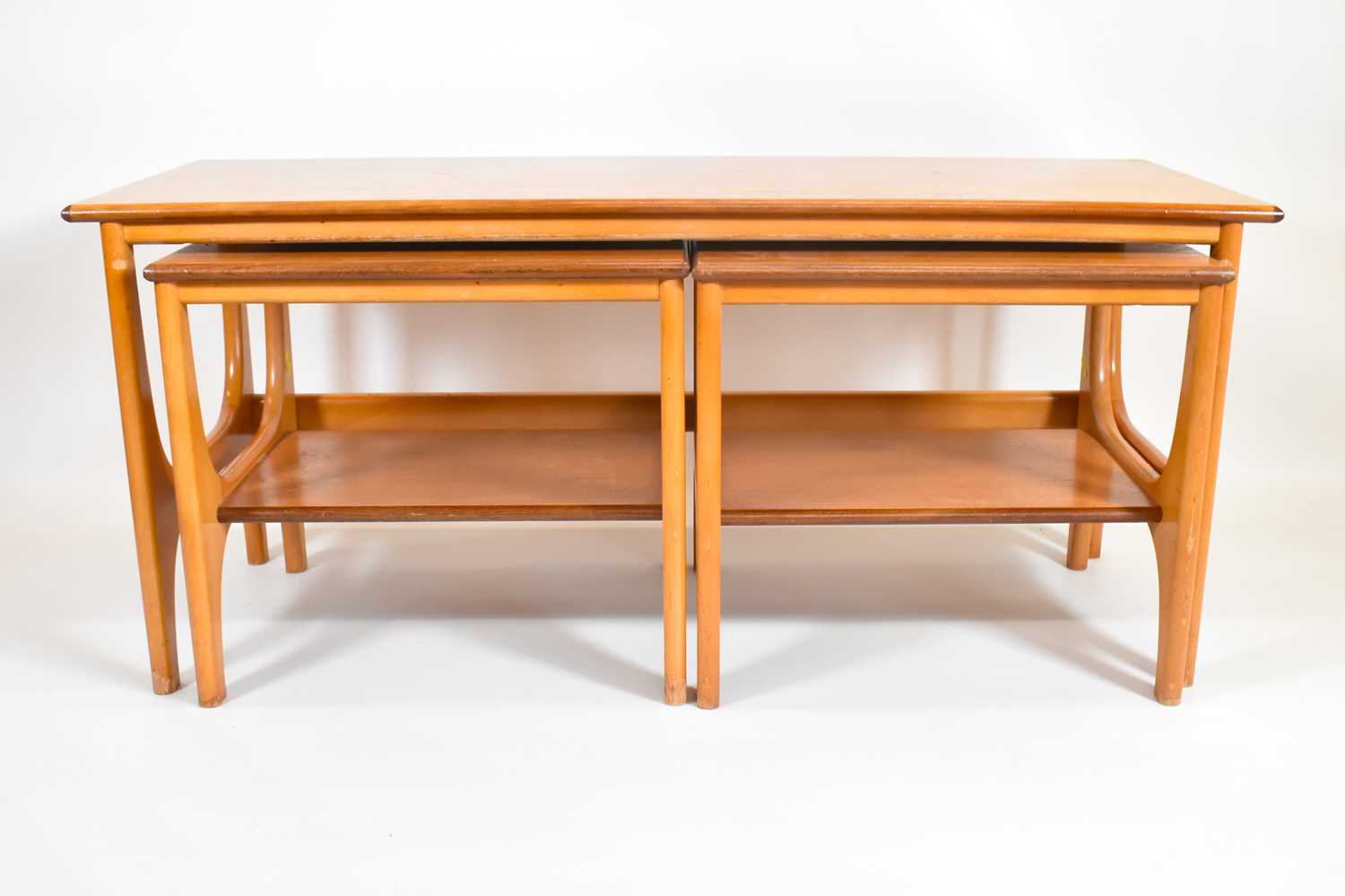 Lot 4 - A nest of three 1960s/70s G-Plan style tables,...