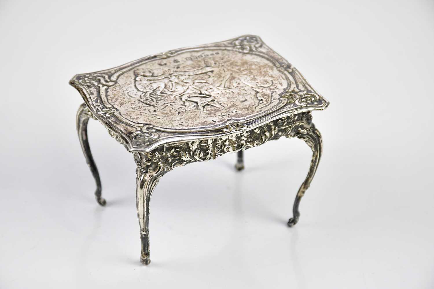 Lot 2168 - A Dutch hallmarked silver miniature table,
