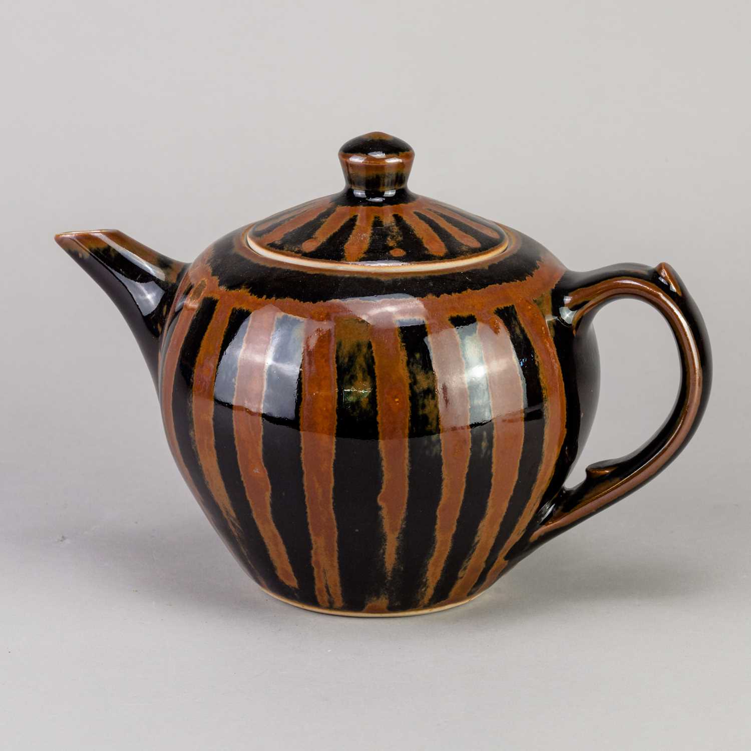 Lot 200 - DEREK EMMS (1929-2004); a stoneware teapot...