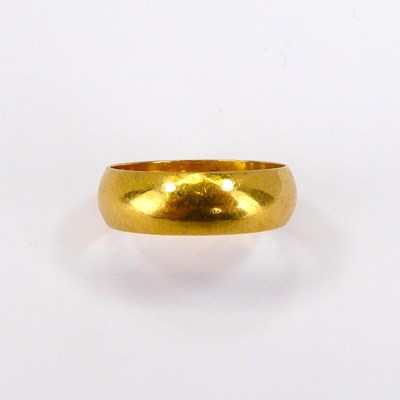 Lot 681 - A 22ct gold wedding band, size L, approx. 4.5g.