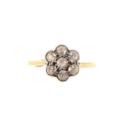 Lot 703 - An 18ct gold white stone flower head cluster...