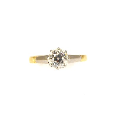 Lot 687 - An 18ct gold solitaire ring with claw set...