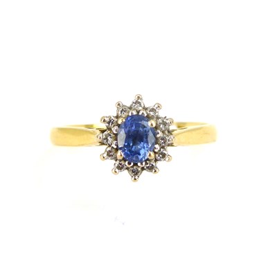 Lot 705 - An 18ct gold ring with central claw set...