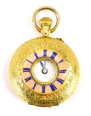 Lot 858 - An 18ct gold demi-hunter pocket watch of small...