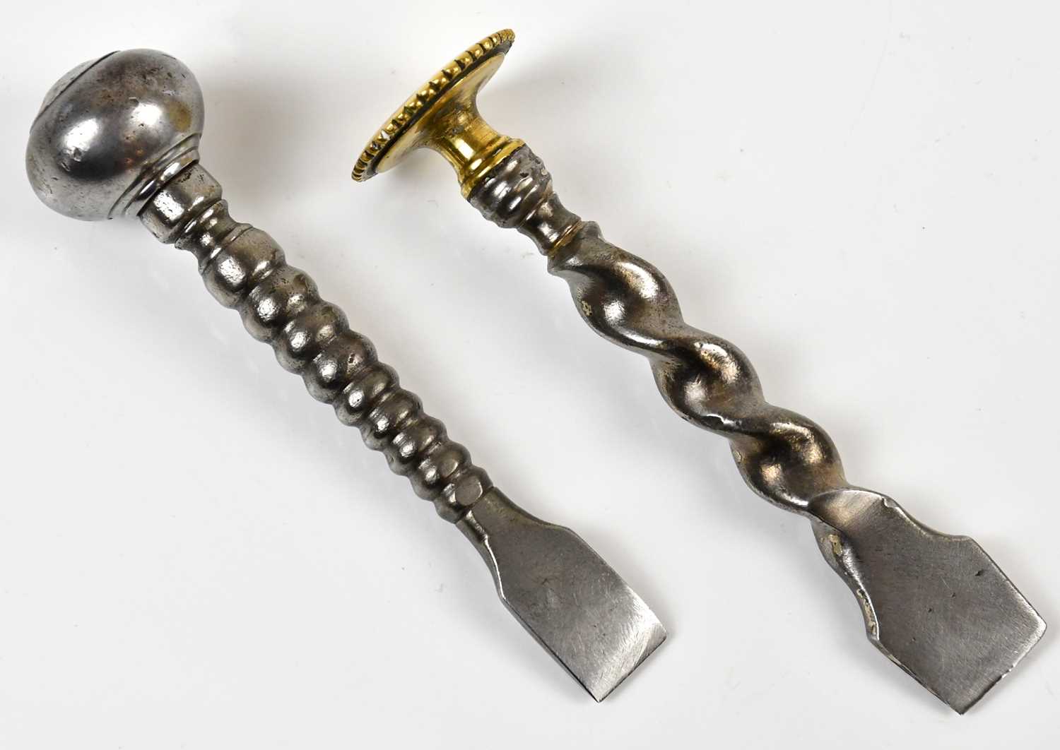 Lot 1371 - Two 18th century steel button hole cutters...
