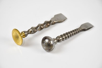 Lot 1371 - Two 18th century steel button hole cutters...