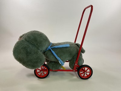 Lot 374 - DEANS; a vintage push along plush elephant,...