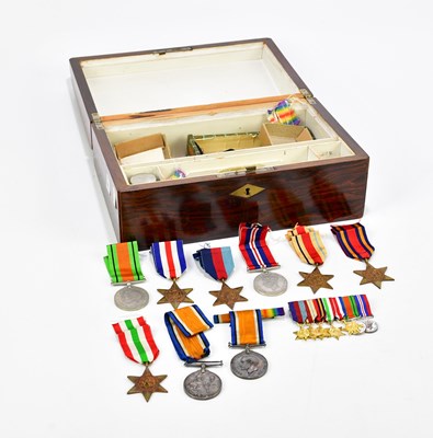 Lot 2599 - A collection of WWI and WWII medals and...