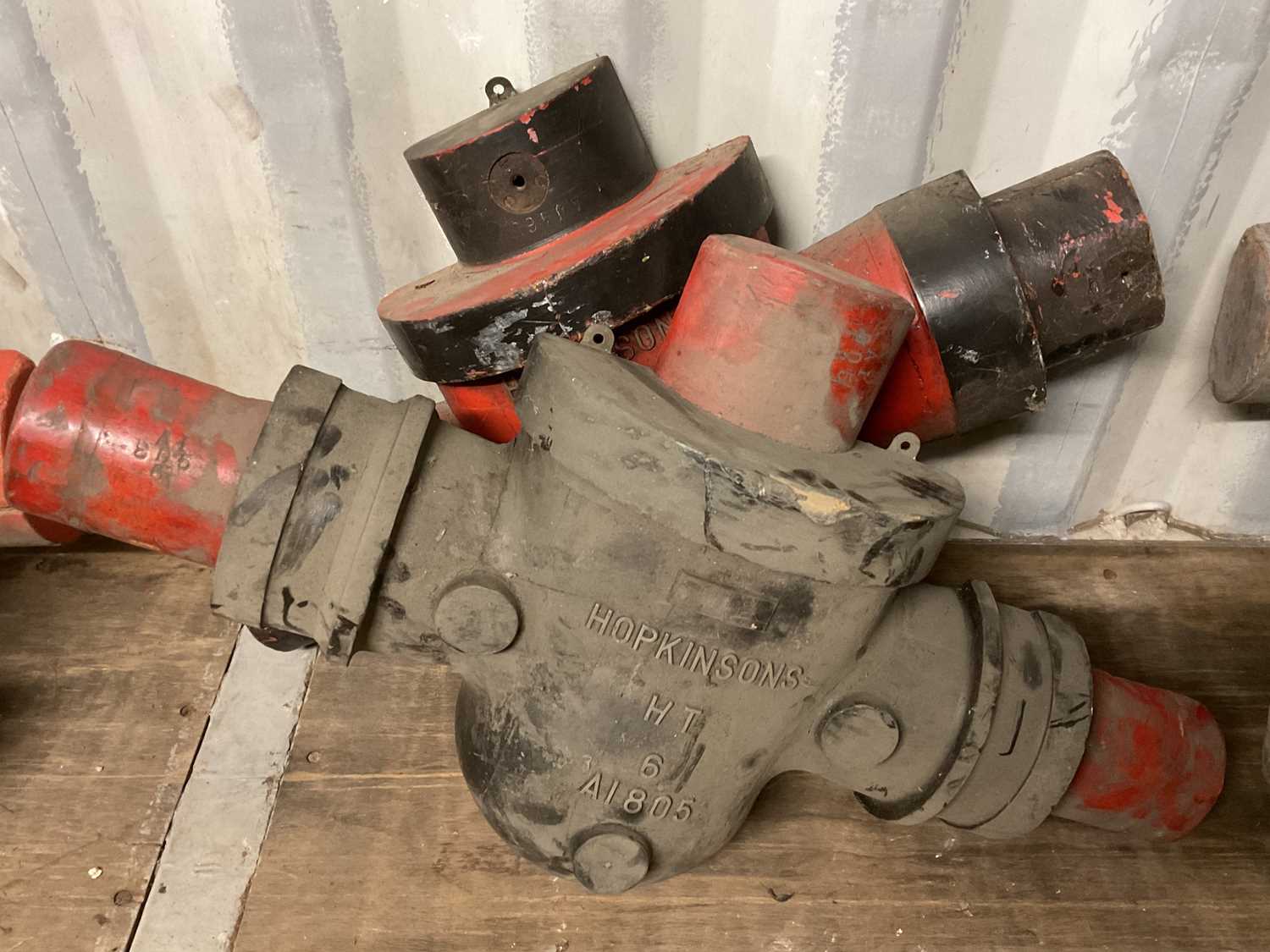 Lot 572 - Two wooden casting patterns for brass valves,...