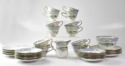 Lot 332 - A Delphine part tea service with printed...