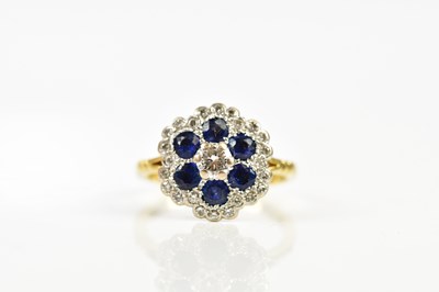 Lot 70 - An 18ct yellow gold sapphire and diamond chip...