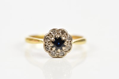 Lot 51 - An 18ct yellow gold sapphire and diamond...