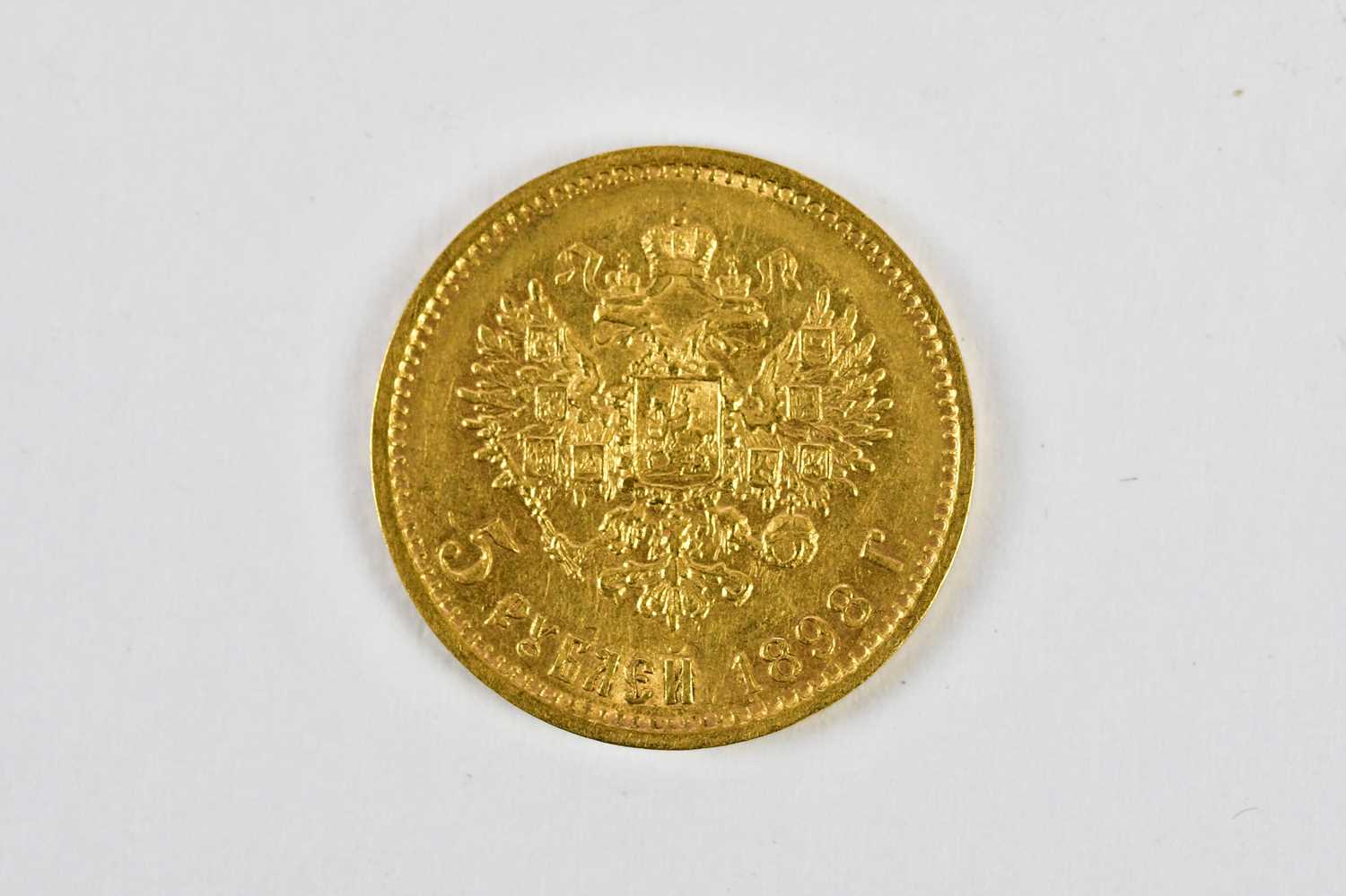 Lot 2557 - A Russian five rouble gold coin, 1898,