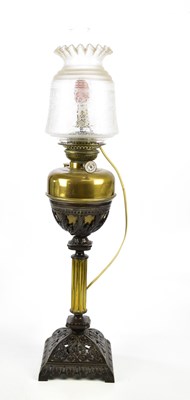 Lot 1531 - A brass converted oil lamp, height 80cm.