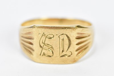 Lot 197 - A yellow metal signet ring with engraved...