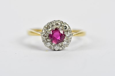 Lot 147 - An 18ct yellow gold ruby and diamond...