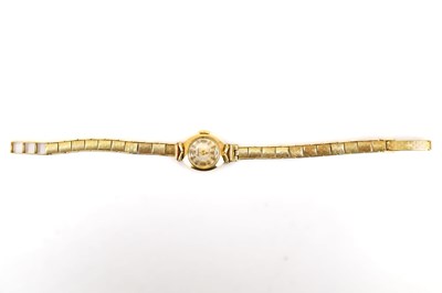 Lot 867 - ACCURIST; a ladies' 9ct gold wristwatch, the...