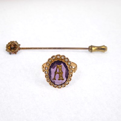 Lot 735 - A Victorian gold ring with central initial A,...