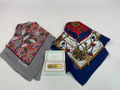 Lot 226 - A Christian Dior silk scarf, a Diorissimo...