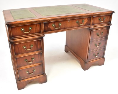 Lot 9 - A modern mahogany pedestal desk, the...