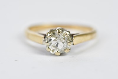 Lot 49 - A yellow metal diamond solitaire ring, the...