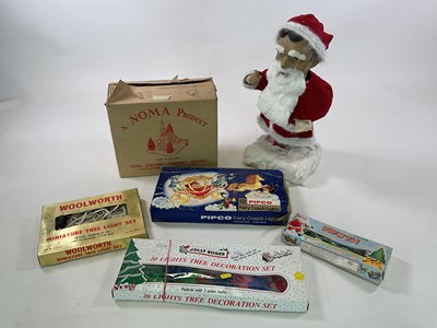 Lot 148 - Vintage Christmas items comprising a papier...