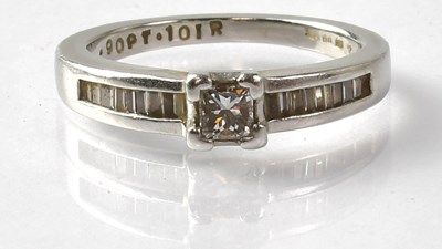 Lot 678 - A platinum solitaire diamond ring with square...