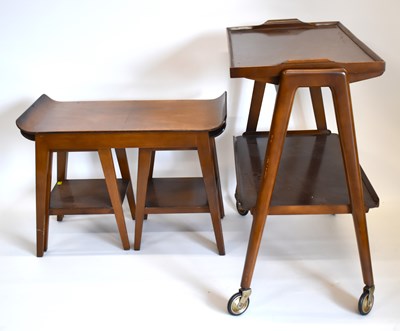 Lot 86 - A vintage walnut nest of three tables, the...
