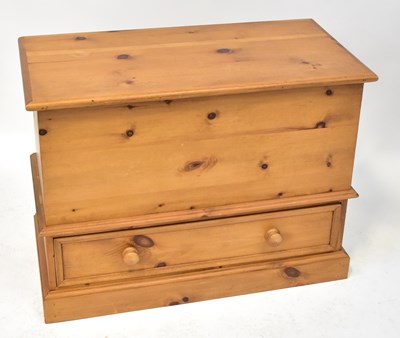 Lot 94 - A modern waxed pine blanket box with lift-up...