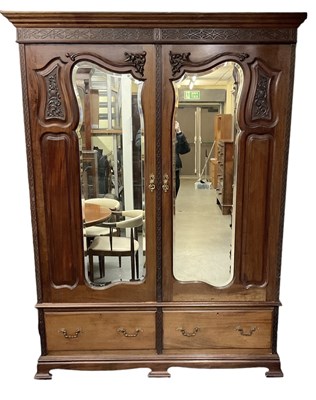Lot 35 - An early 20th century mahogany wardrobe, with...