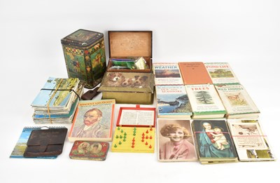 Lot 227 - A collectors' lot to include a tin with...