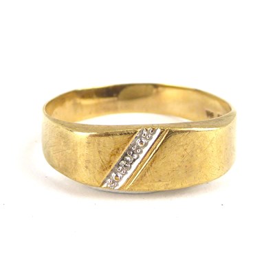 Lot 717 - A 9ct gold band ring with flat table and...