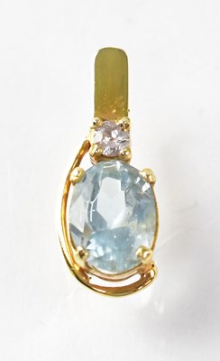 Lot 797 - A yellow metal pendant set with aquamarine and...