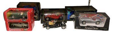 Lot 513 - A group of seven large boxed model vehicles...