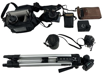 Lot 358 - A group of cameras, equipment and lenses...